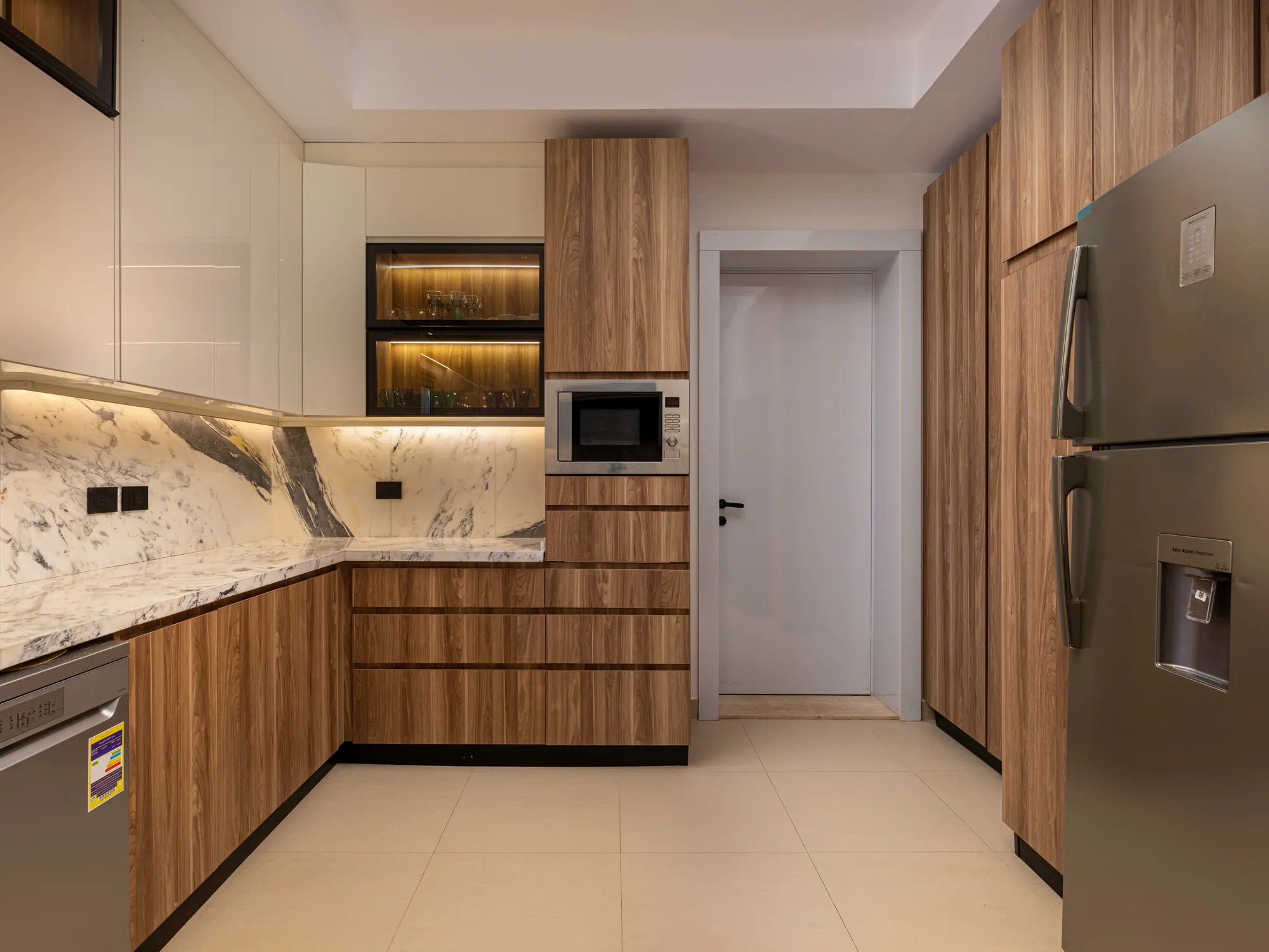 Walnut tall units with integrated ovens, New Giza Villa