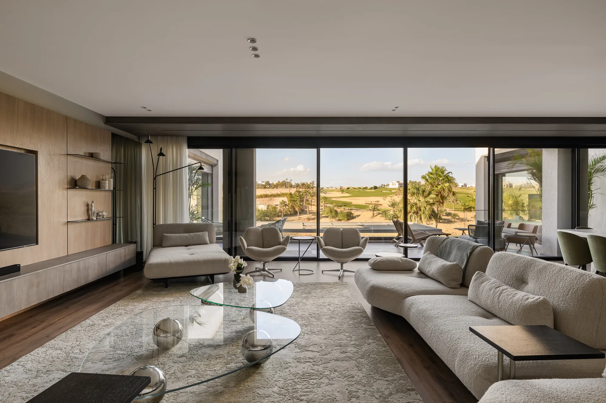 Open-plan living area overlooking the garden, Palm Hills Residence
