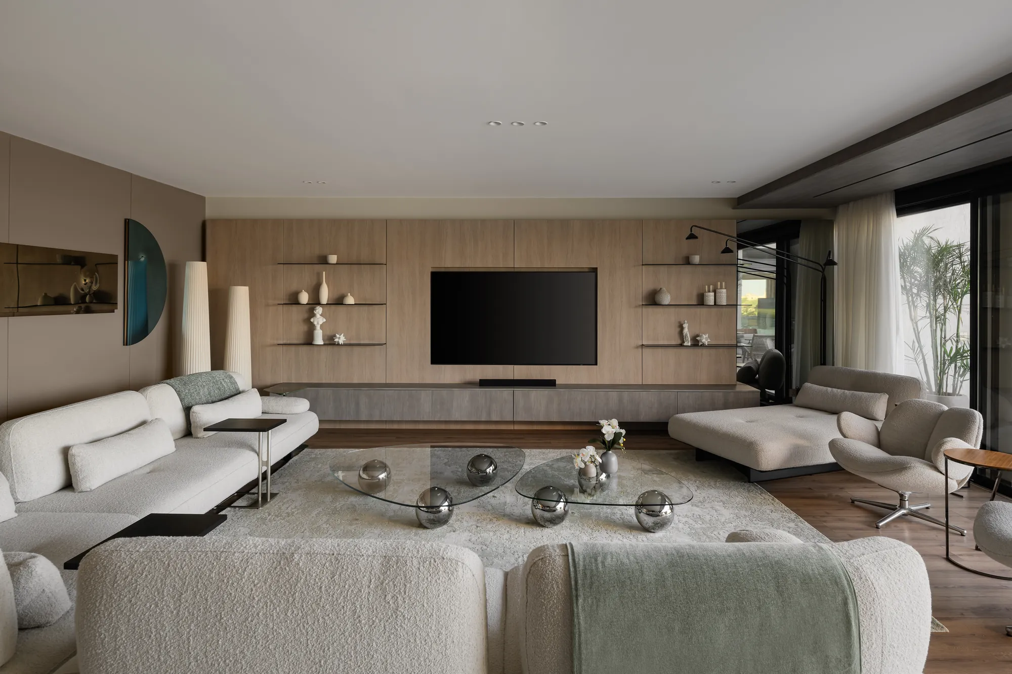 Panelled media wall with floating shelves, Palm Hills Residence