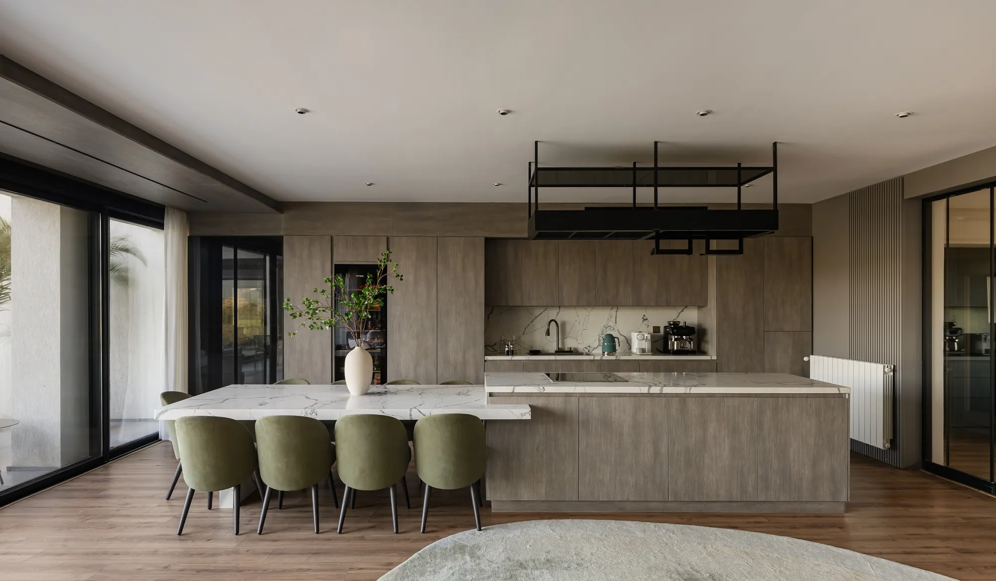 Open kitchen with long island and dining seating, Palm Hills Residence