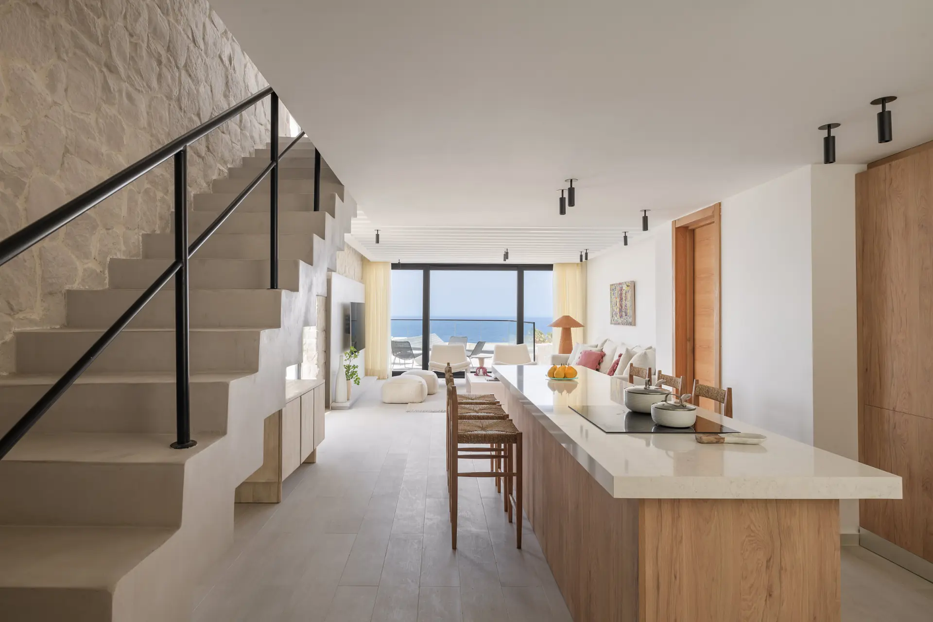 Light oak kitchen with long dining counter, Somabay Lodge